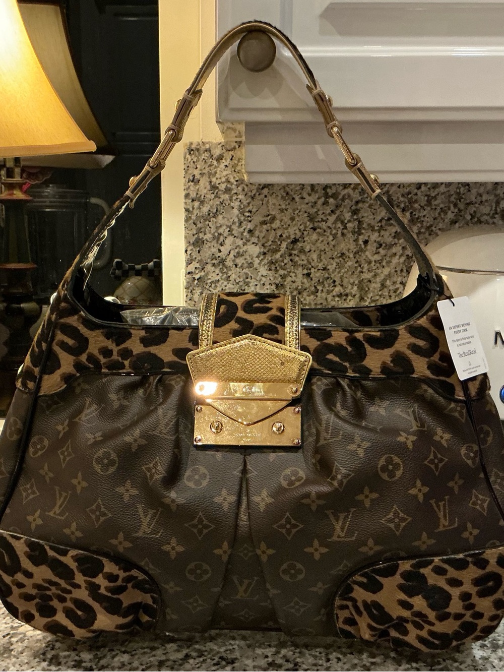 Louis Vuitton Brown Monogram Shoulder Bag with Leopard Accents and Gold Hardware